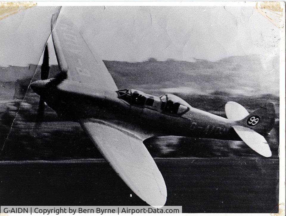 G-AIDN, 1944 Supermarine 502 Spitfire TR.8 (LF.VIIIc) C/N 6S/729058, Hampshire Aero Club's Spitfire (G-AIDN) on a fast fly by at Eastleigh Airport. circa 1950,s