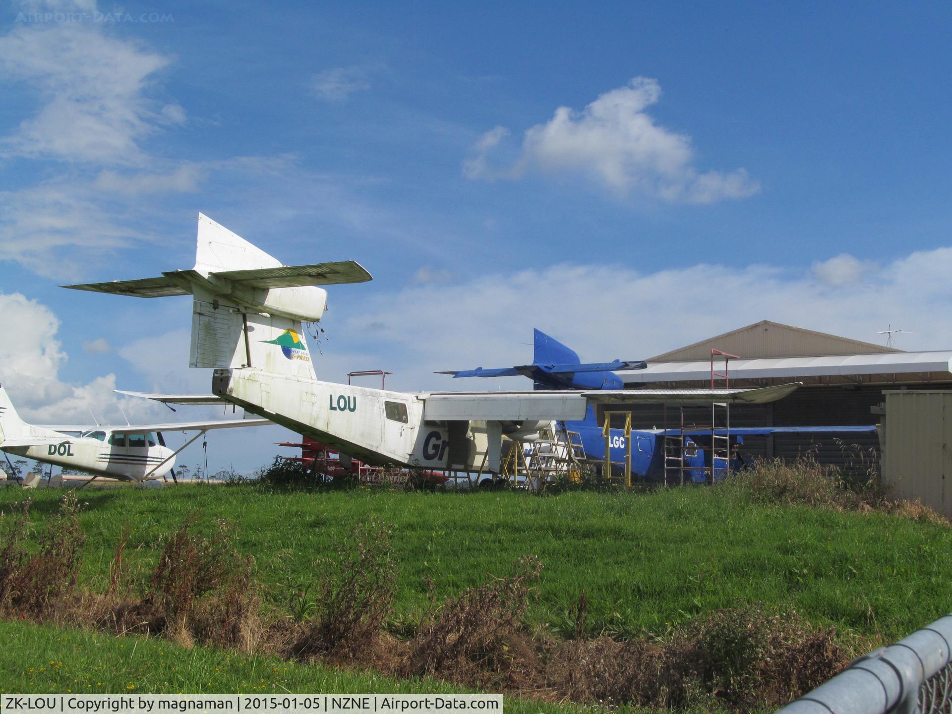 ZK-LOU, 1972 Britten-Norman BN-2A Mk.III-2 Trislander C/N 322, with LGC in background at North Shore - not sure if LOU will fly again