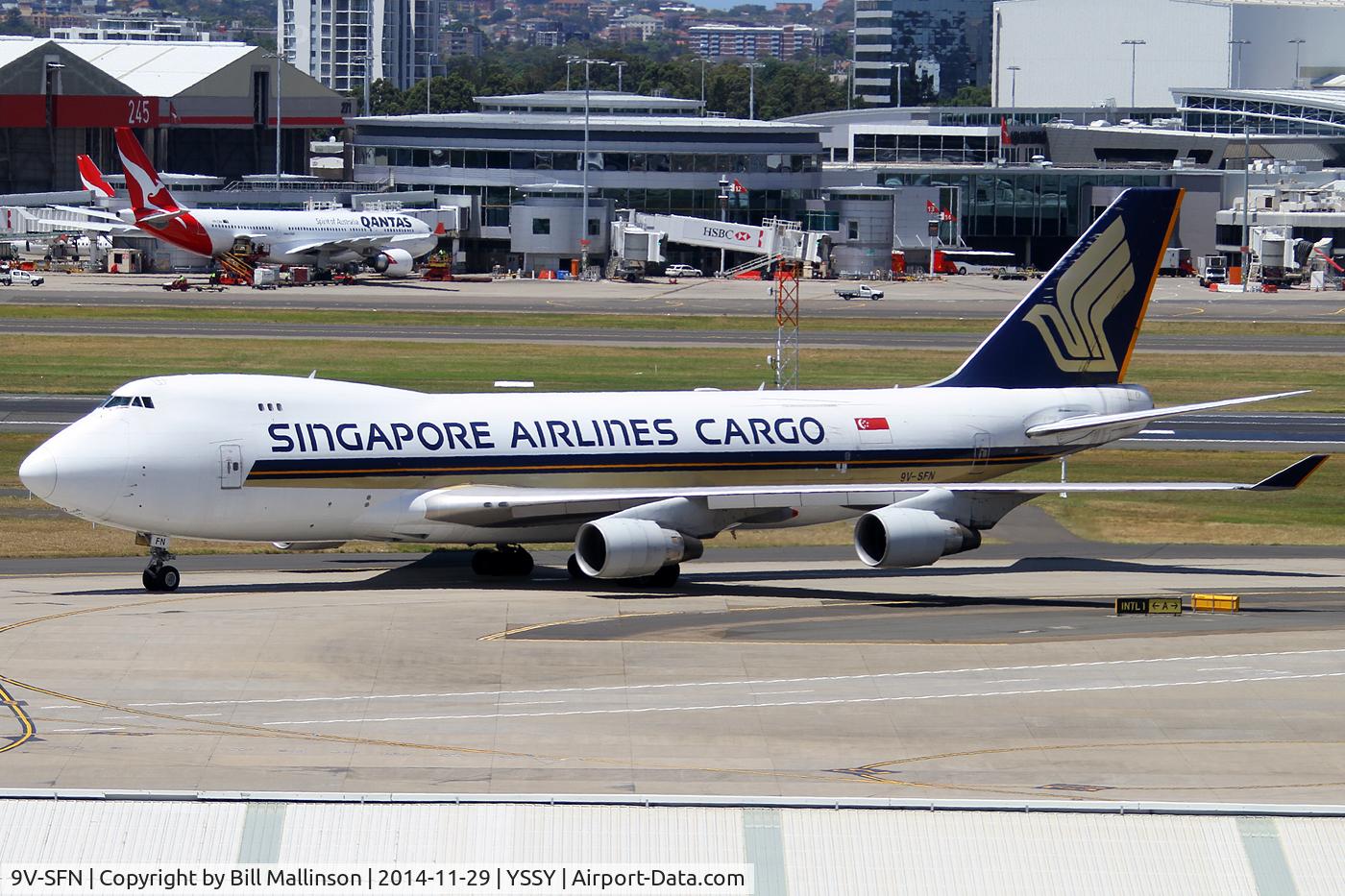9V-SFN, 2004 Boeing 747-412F/SCD C/N 32899, TAXIING TO CARGO BAYS