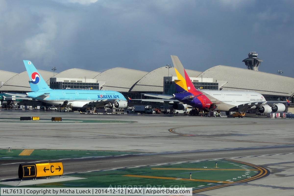 HL7613, 2010 Airbus A380-861 C/N 059, Direct competitors next to each other at TBIT