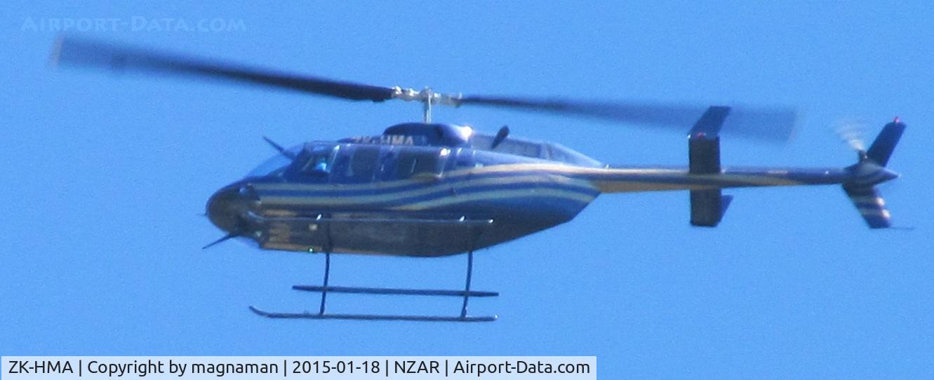 ZK-HMA, Bell 206L LongRanger LongRanger C/N 45049, over garden on way to ardmore