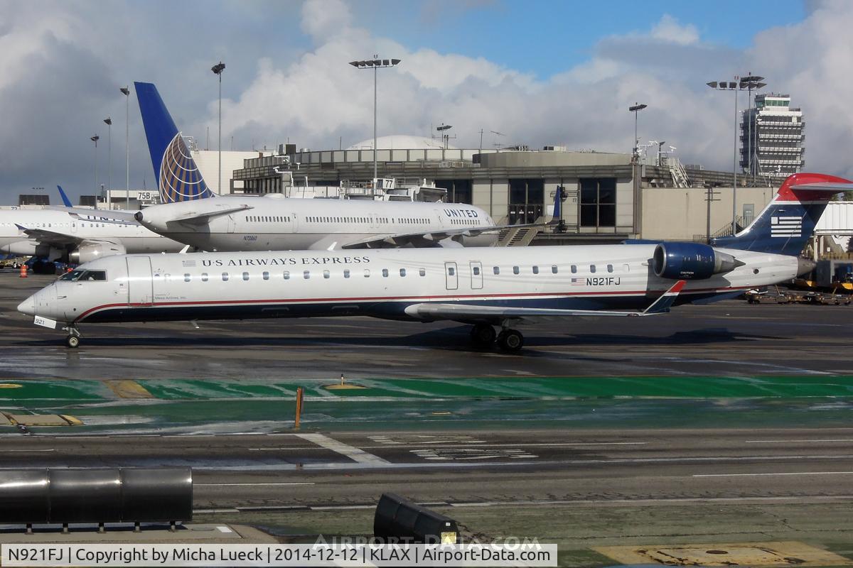 N921FJ, 2004 Bombardier CRJ-900ER (CL-600-2D24) C/N 15021, At LAX