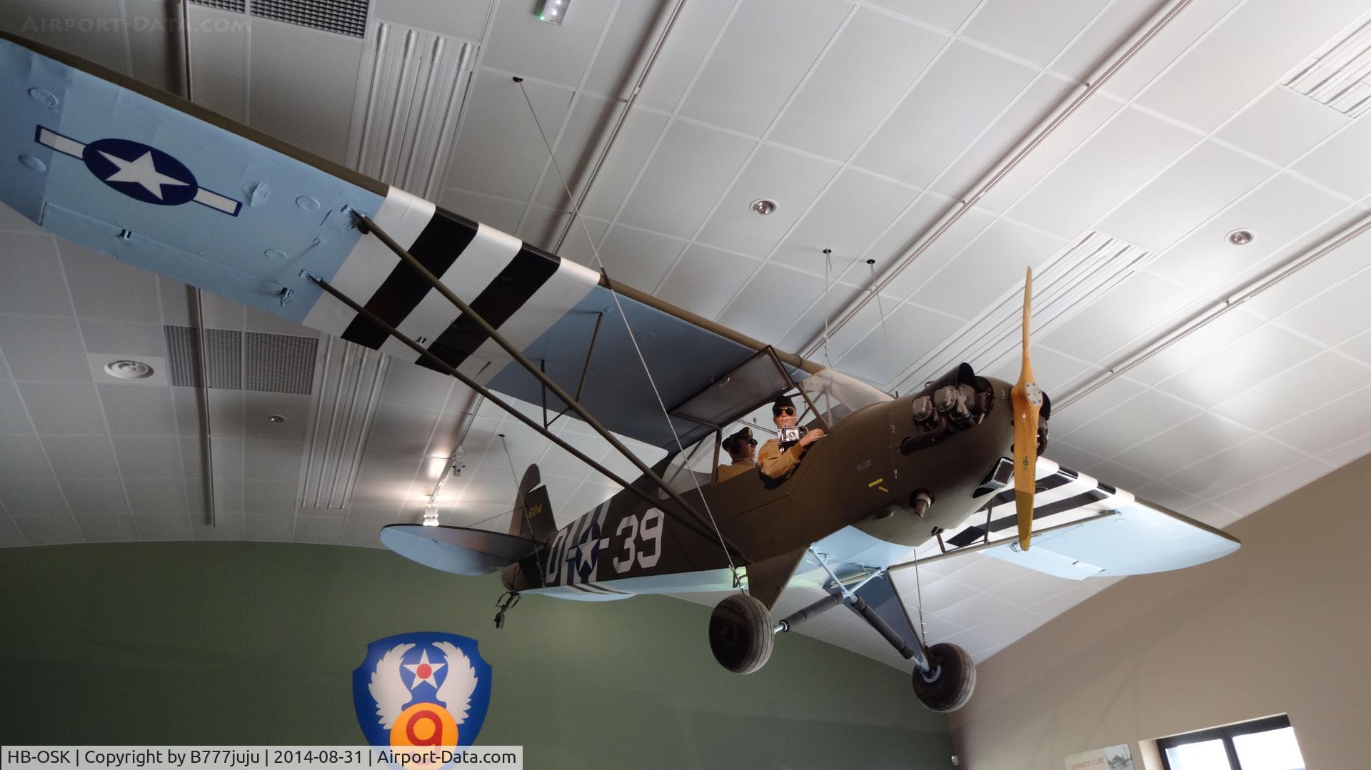 HB-OSK, 1944 Piper L-4J Grasshopper (J3C-65D) C/N 13139, preserved at Saint-Mére-Eglise Muséeum