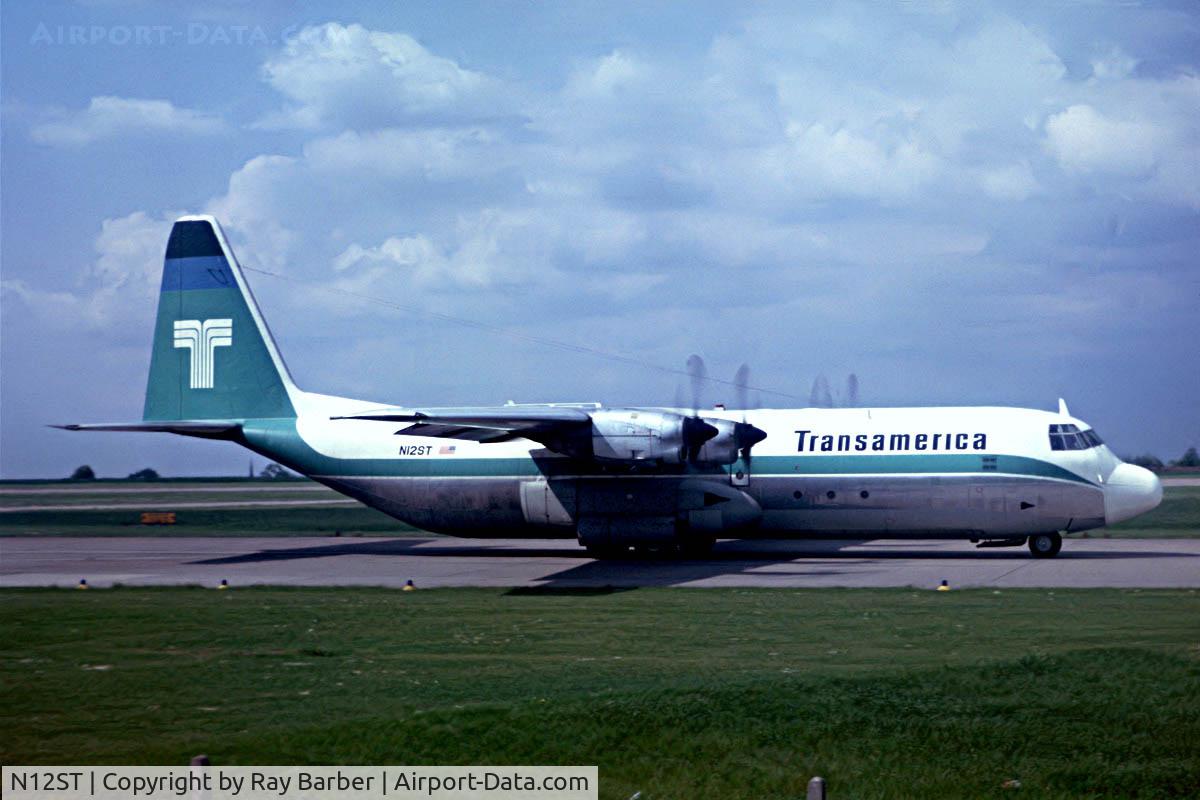 N12ST, 2004 Lockheed L-100-30 Hercules (L-382G) C/N 382-4388, Lockheed L-100-30 Hercules [4388] (Transamerica Airways) (Place and date unknown). From a slide.