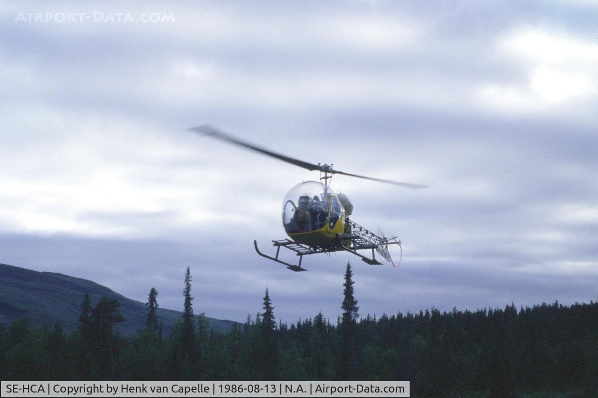 SE-HCA, Bell 47G-2 C/N 1492, Bell 47 taking off from a clearing in the forest at Pårtestugorna (mountain hut) near Kvikkjokk in Swedish Lappland.