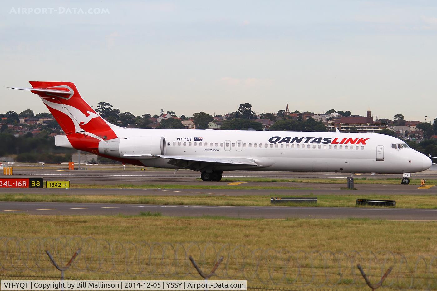 VH-YQT, 2004 Boeing 717-200 C/N 55179, taxiing from 34R