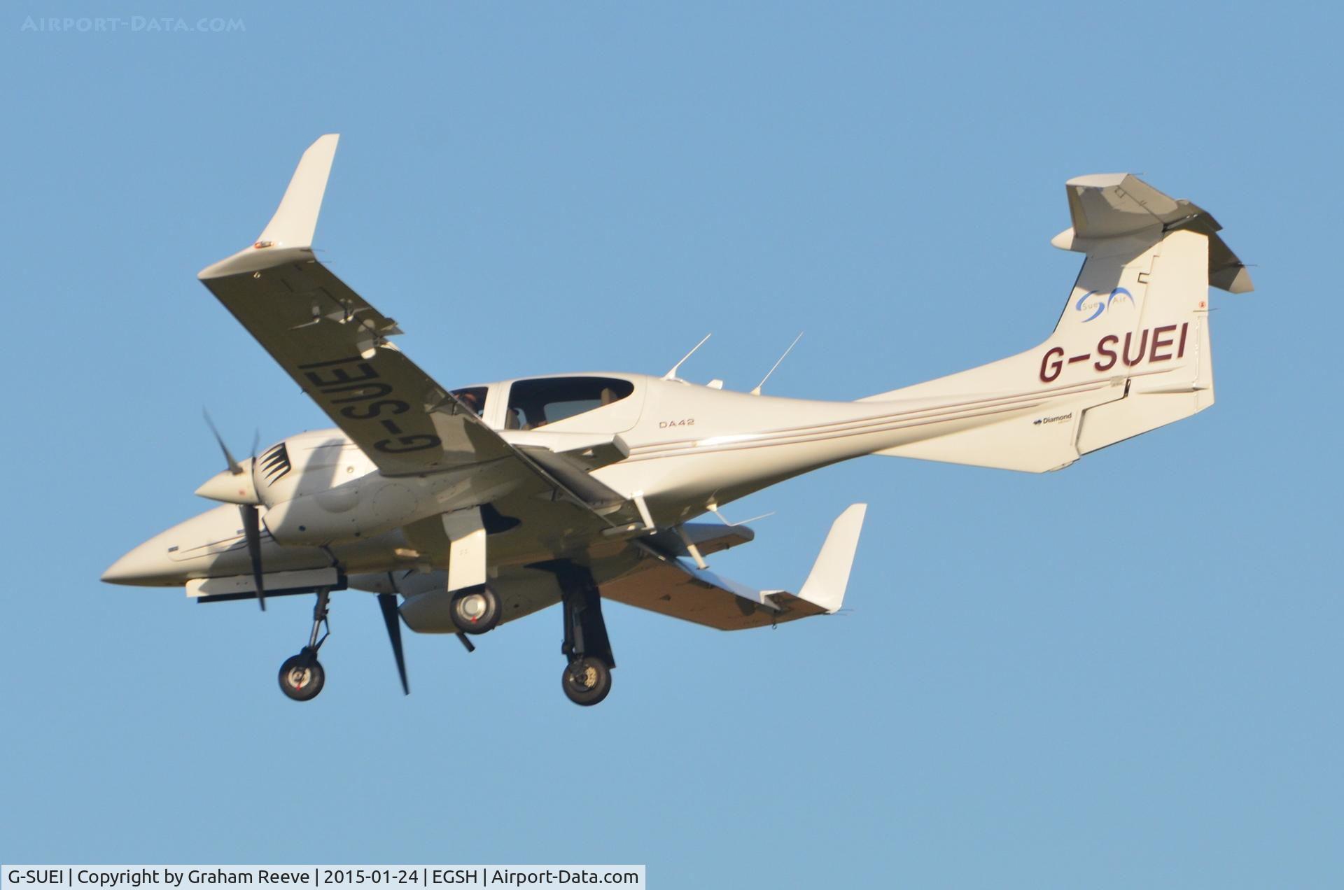 G-SUEI, 2009 Diamond DA-42 Twin Star C/N 42.415, About to land at Norwich.
