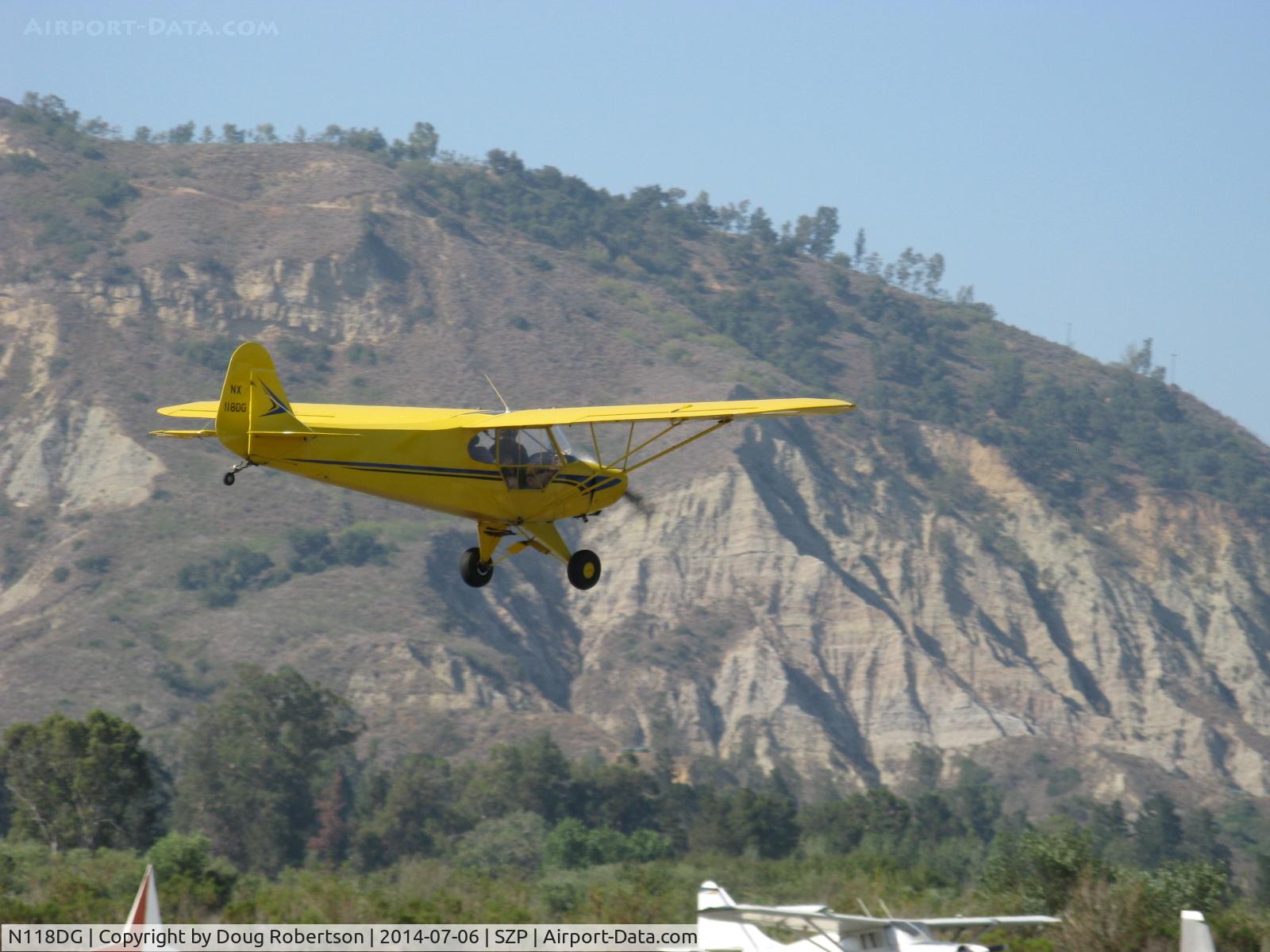 N118DG, 2008 Piper PA-18 Replica C/N 001, 2008 Ganzer XPA18, Continental O-200 100 Hp, on final for Rwy 22L grass 
