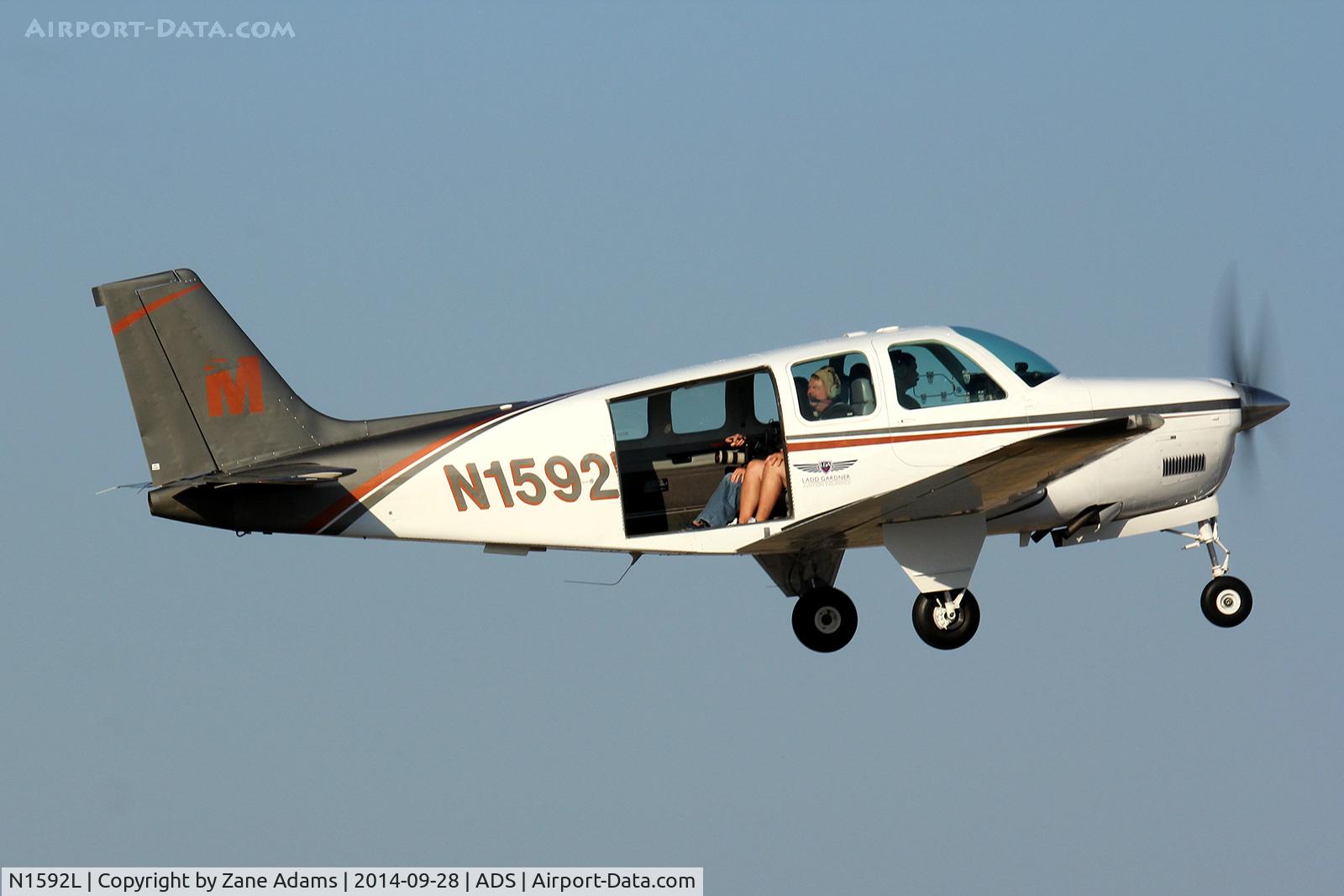 N1592L, 1976 Beech A36 Bonanza 36 C/N E-832, Air to Air photo mission leaving Addison Airport