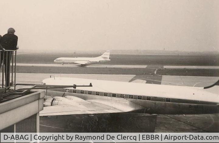 D-ABAG, Douglas C-54B Skymaster (DC-4) C/N 27233, Tranportflug DC-4 D-ABAG at Brussels Airport on 1965-04-25. 
Ex 44-9007, LX-IOD. Later became TN-ABS in Congo.
Iberia Caravelle EC-AYO on taxiway.