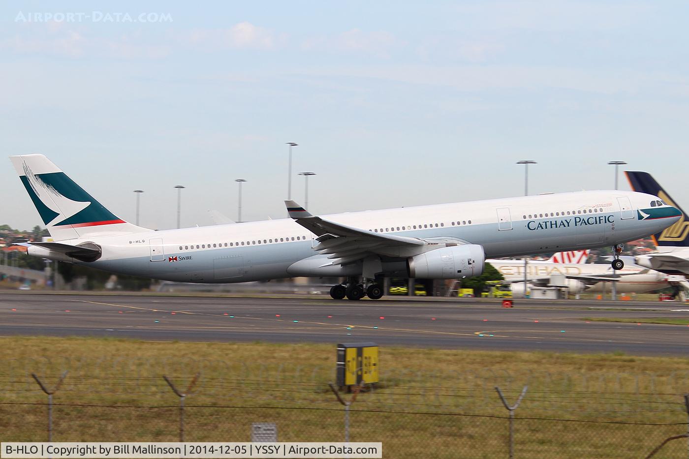 B-HLO, 2001 Airbus A330-343 C/N 393, rotating from 34L