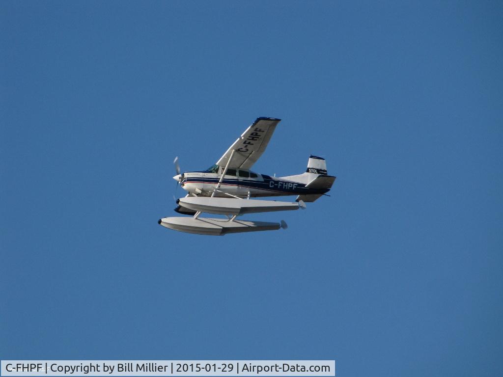 C-FHPF, 1968 Cessna 180H Skywagon C/N 18051954, Cessna 180H Skywagon 'C-FHPF' flies over Pitt River In Pitt Meadows BC Jan29 2015  SXX4_1979
