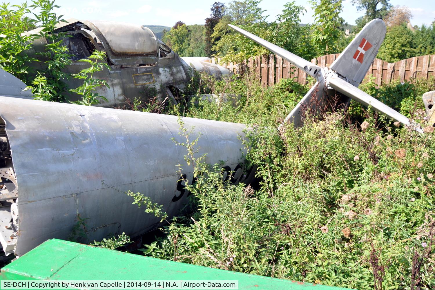 SE-DCH, Gloster Meteor TT.20 C/N AW5549, The rear fuselage and tail of this Gloster Meteor TT.Mk.20 is now deteriorating in the bush-bush at the Chateau de Savigny aircraft museum.