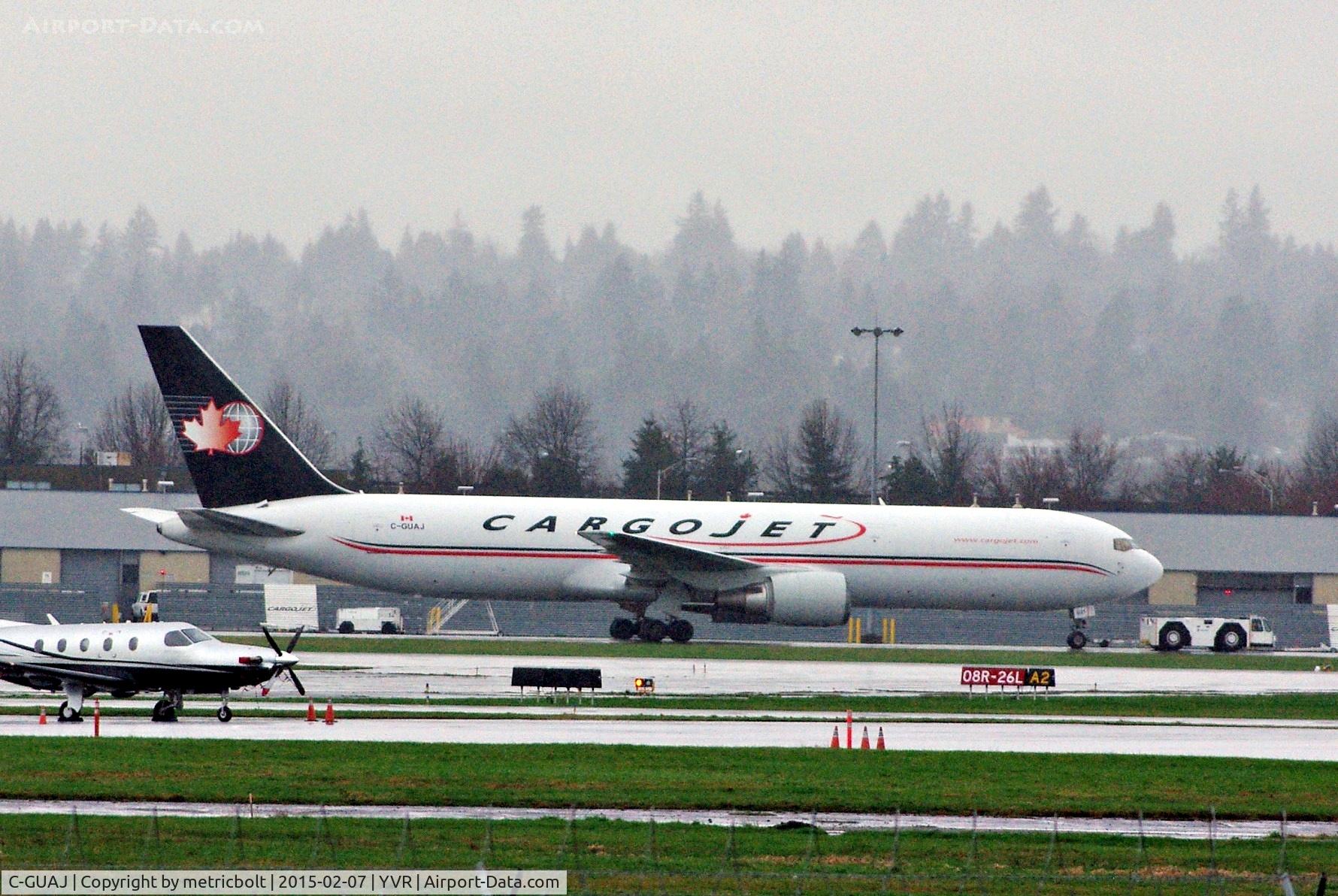 C-GUAJ, 1992 Boeing 767-35E/ER C/N 26063, Under tow at YVR