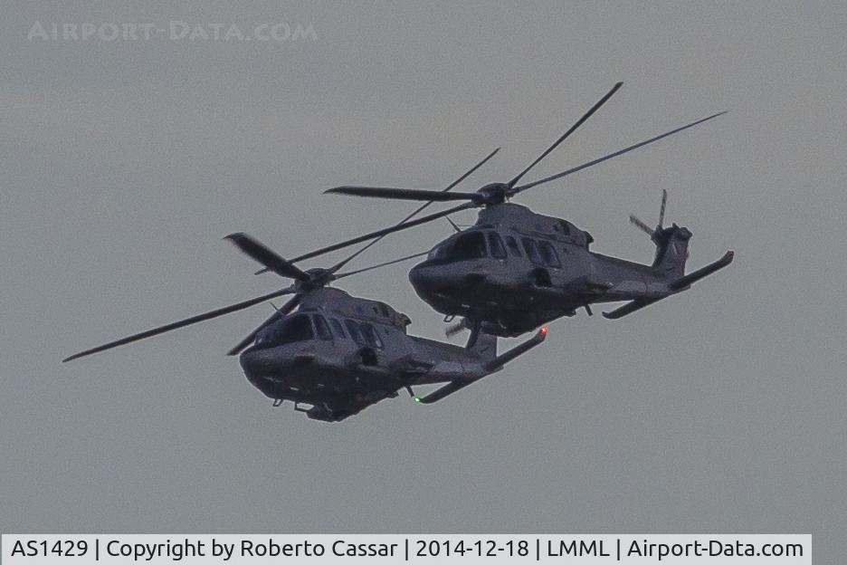 AS1429, AgustaWestland AW-139 C/N 31595, Sorry for the bad quality of the pic as it was already dark. Seen for the first time with it's Sister Ship AS1428 over the Grand Harbour