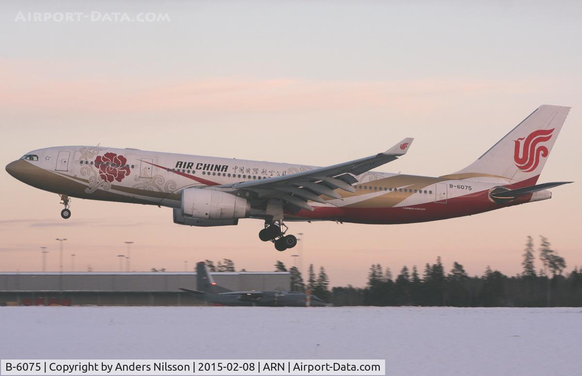 B-6075, 2006 Airbus A330-243 C/N 785, On very short final runway 01L.