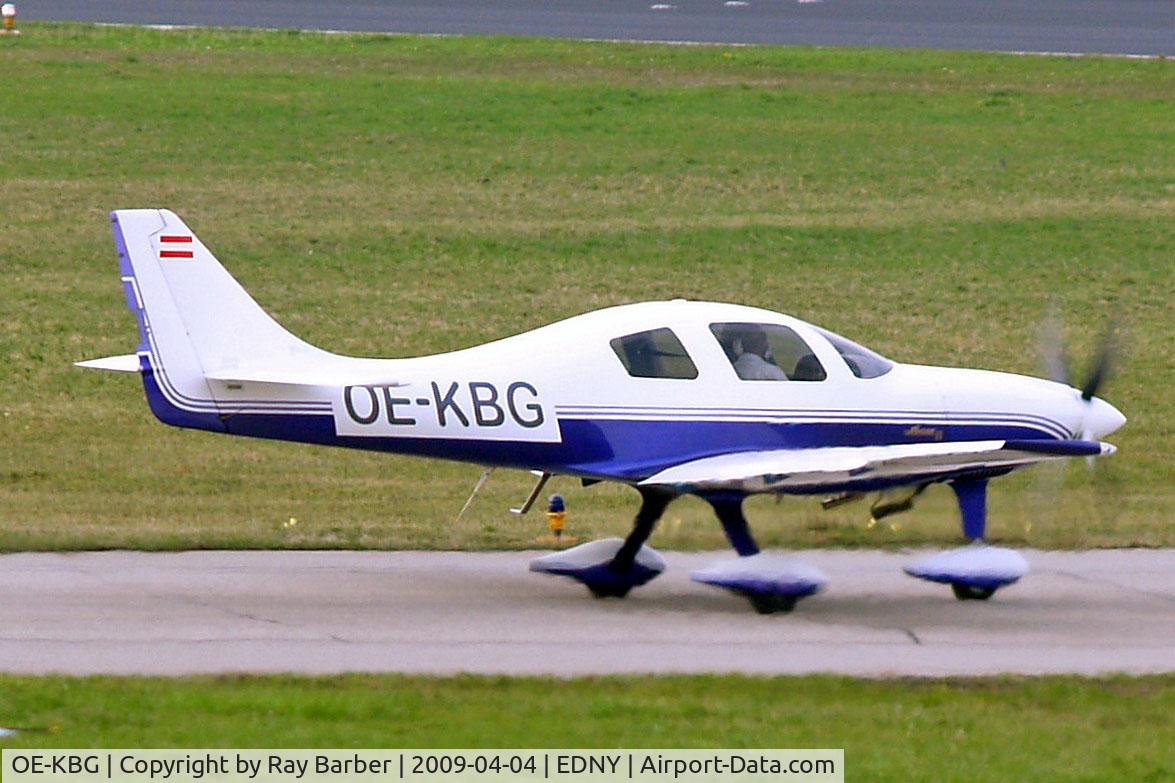 OE-KBG, 1998 Lancair Super ES C/N A-ES-01, Neico Lancair ES [AES-01] Friedrichshafen~D 04/04/2009. Slight heat haze from exhaust of airliner affecting the undercarriage.
