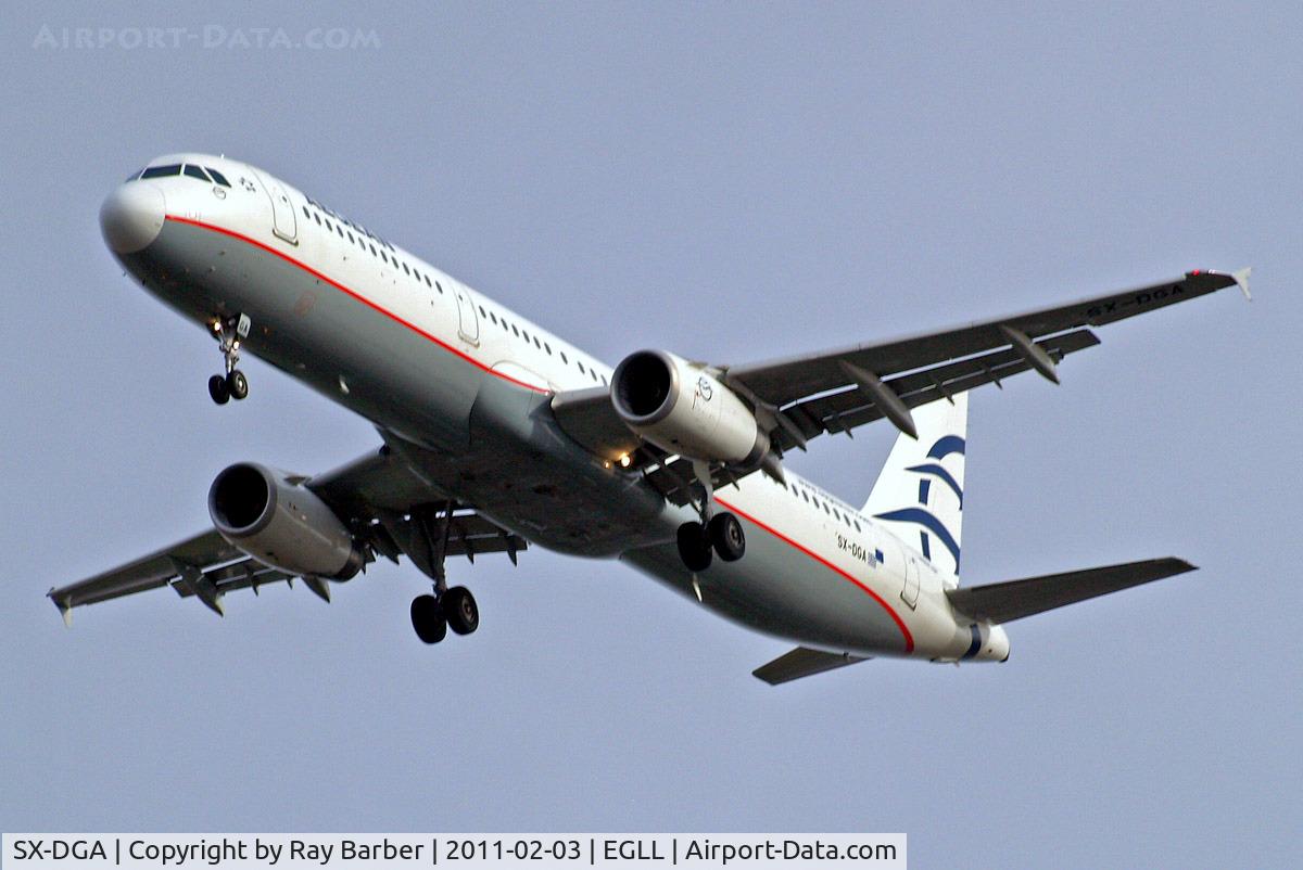 SX-DGA, 2009 Airbus A321-231 C/N 3878, SX-DGA   Airbus A321-231 [3878] (Aegean Airlines) Home~G 03/02/2011. On approach 27R. White nose cone.