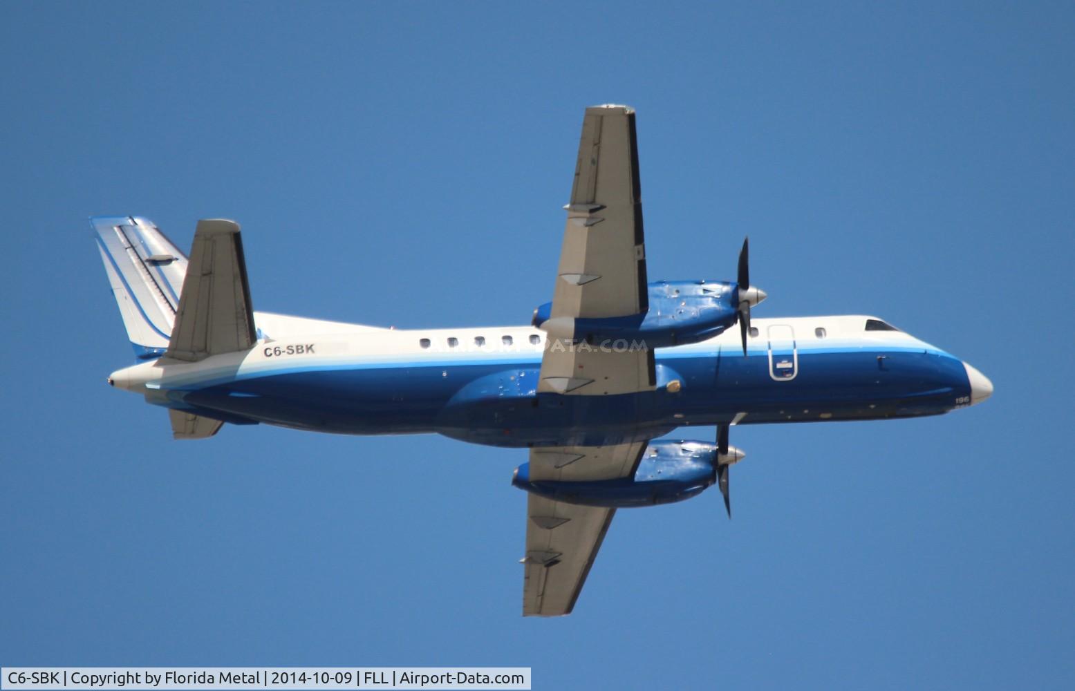 C6-SBK, 1990 Saab 340B C/N 340B-196, Sky Bahamas Saab 340B still in United Express colors