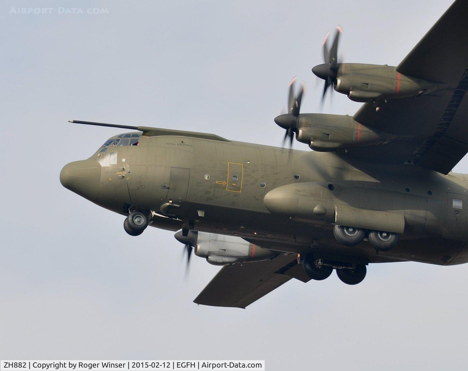 ZH882, 1999 Lockheed Martin C-130J Hercules C.5 C/N 382-5480, RAF C-130J Hercules C.5 aircraft coded 882 of the Brize Norton Transport Wing makes a low pass over Runway 22.