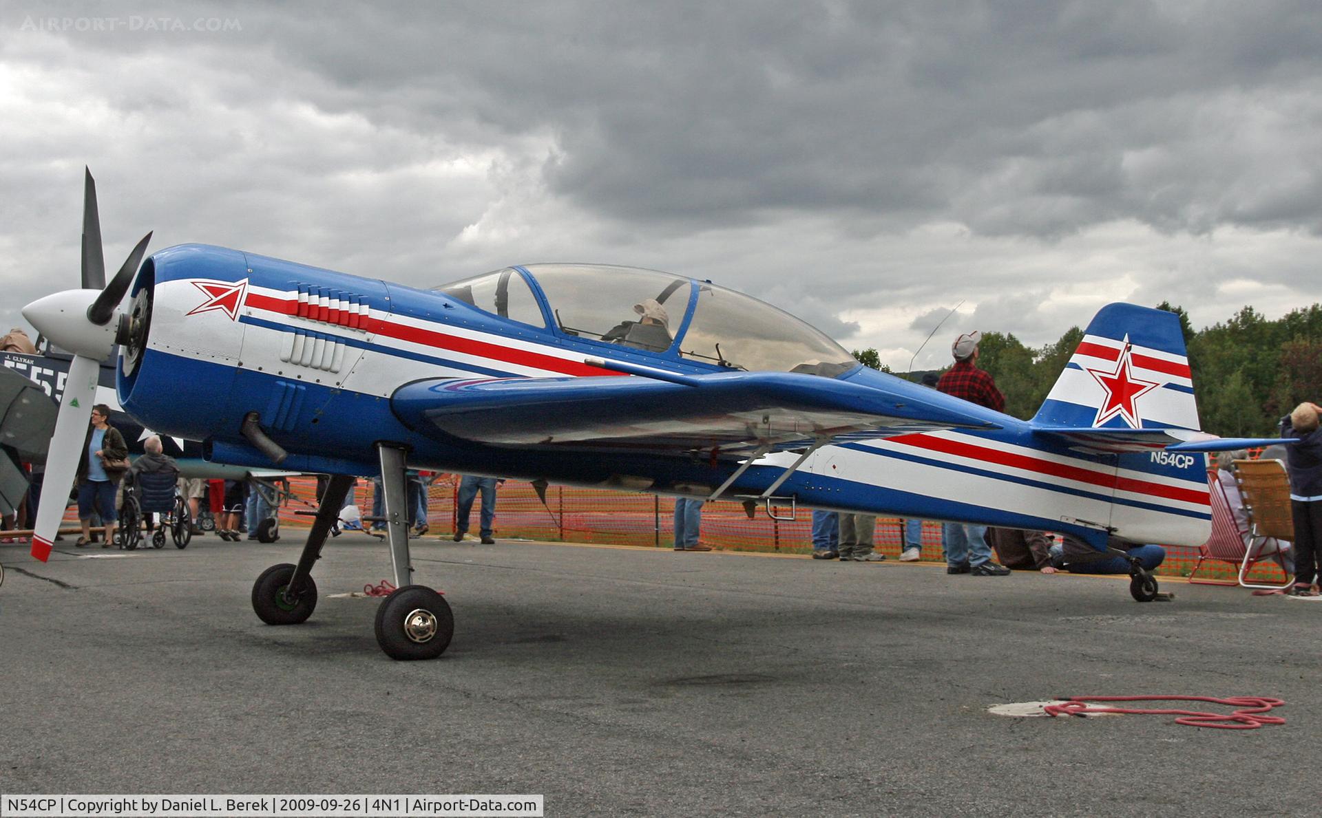 N54CP, 1993 Sukhoi Su-29 C/N 75-02, Sukhoi builds some of the sleekest aircraft around, be they fighters, trainers, aerobatic aircraft, or even an airliner.  This example was built in 1993.