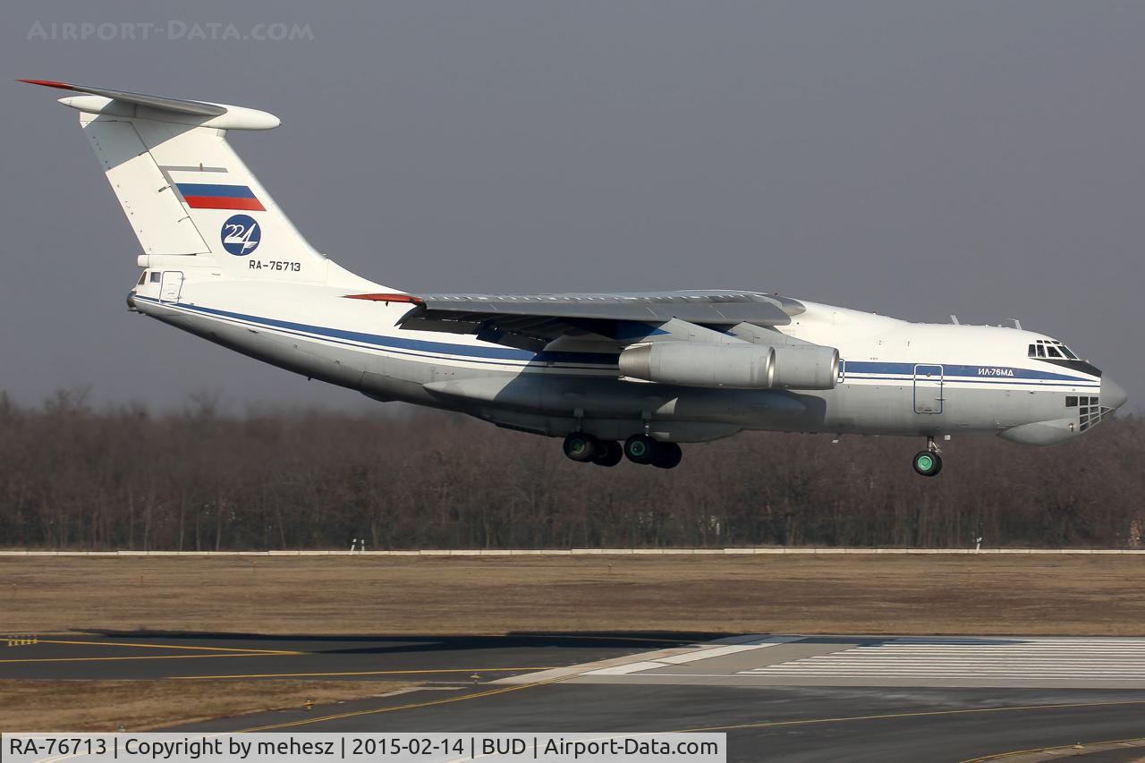 RA-76713, 1986 Ilyushin Il-76MD C/N 63474193, Short final 13R with President Putin's armored vehicle on board.