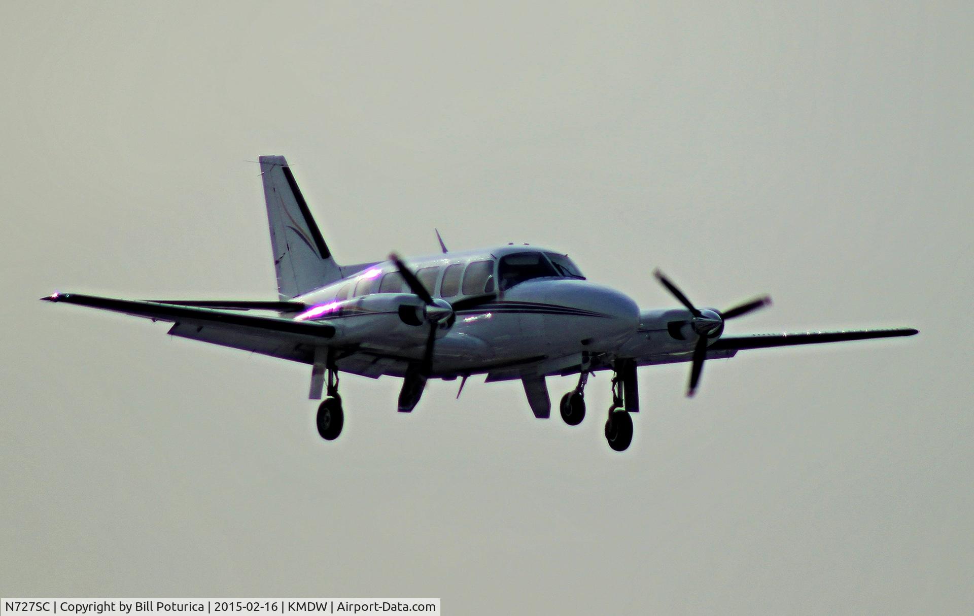 N727SC, 1973 Piper PA-31-350 Chieftain C/N 31-7305110, Piper N727SC on short final for 4R at Chicago Midway.  Note the nose gear not fully extended, moments later the gear collapsed upon landing on runway 4R.