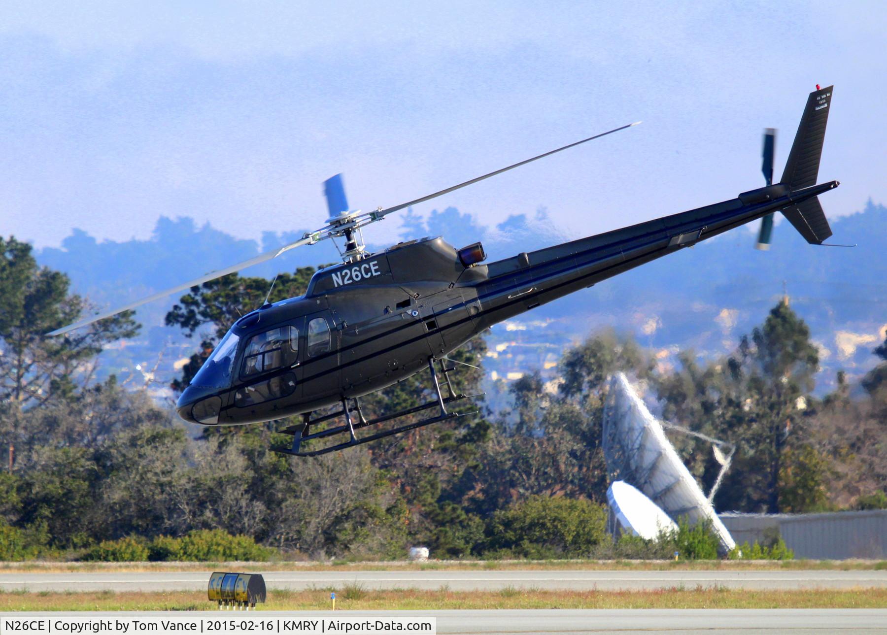 N26CE, 1986 Aerospatiale AS-350B-1 Ecureuil C/N 1930, KMRY/MRY - Departing Monterey Regional Airport at taking on fuel. This is one nice looking helicopter.