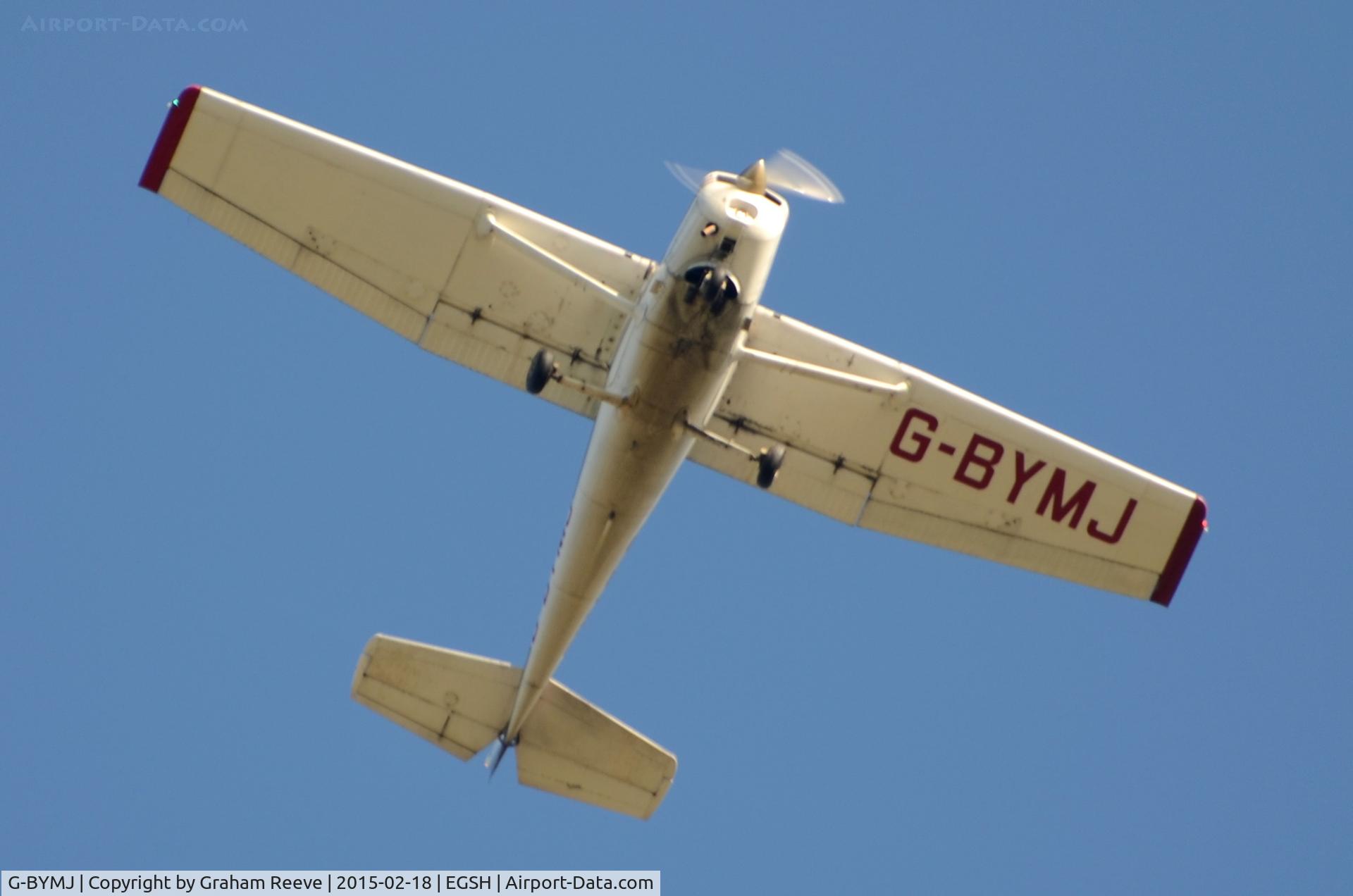 G-BYMJ, 1982 Cessna 152 C/N 152-85564, Over head at Norwich.