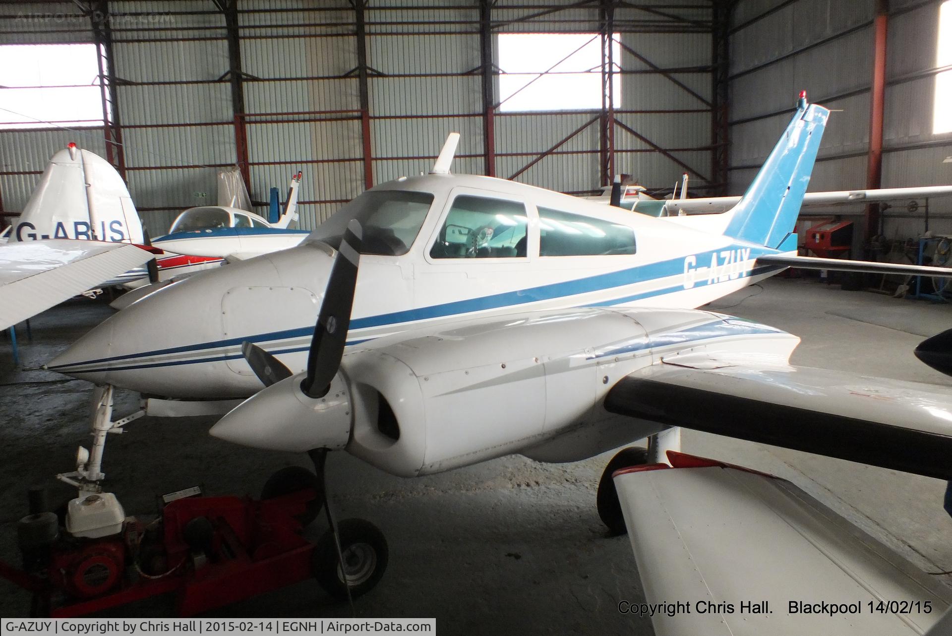 G-AZUY, 1966 Cessna 310L C/N 310L-0012, inside the packed Blackpool Air Centre hangar