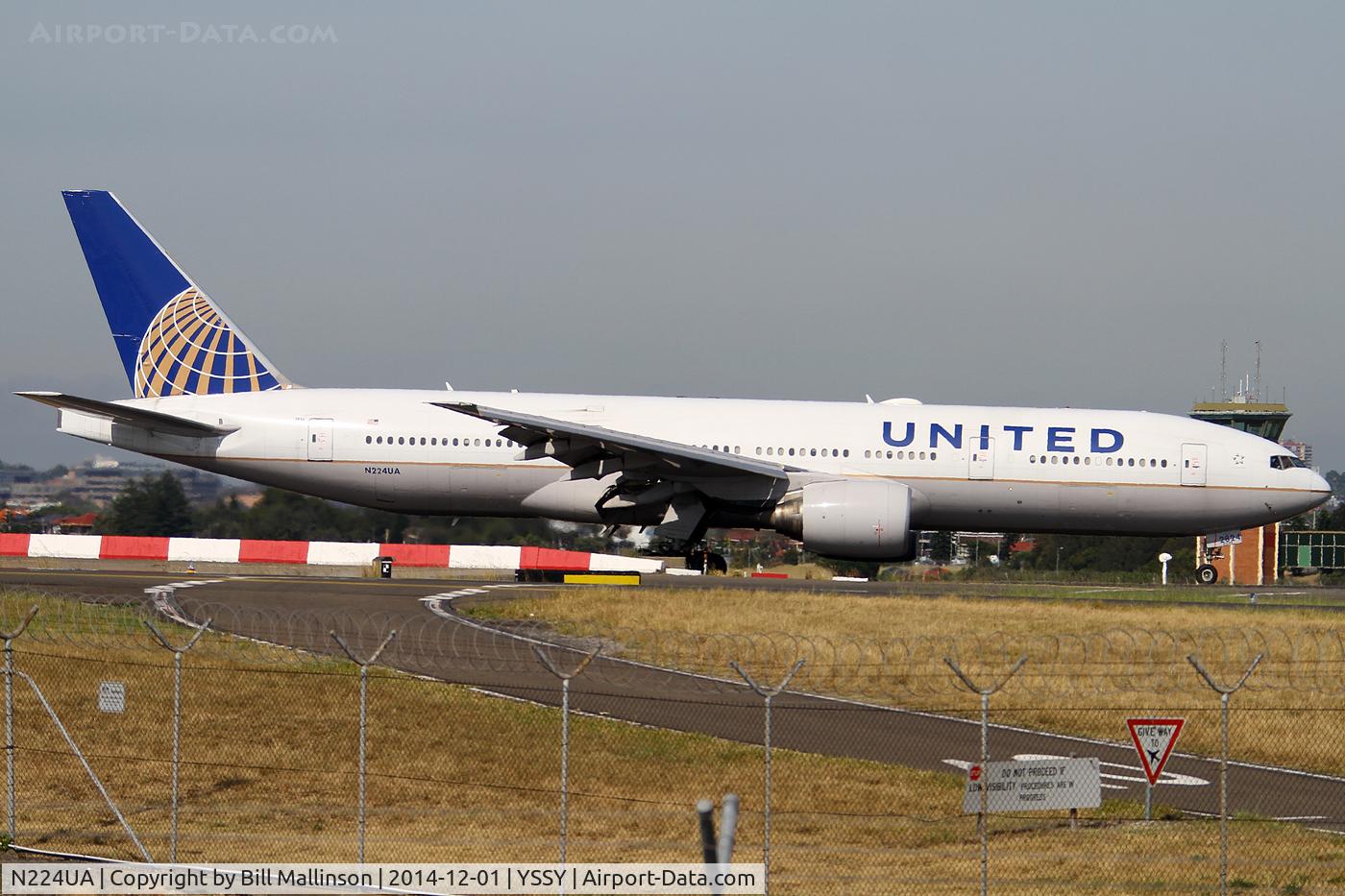 N224UA, 2001 Boeing 777-222 C/N 30225, taxiing off 34L