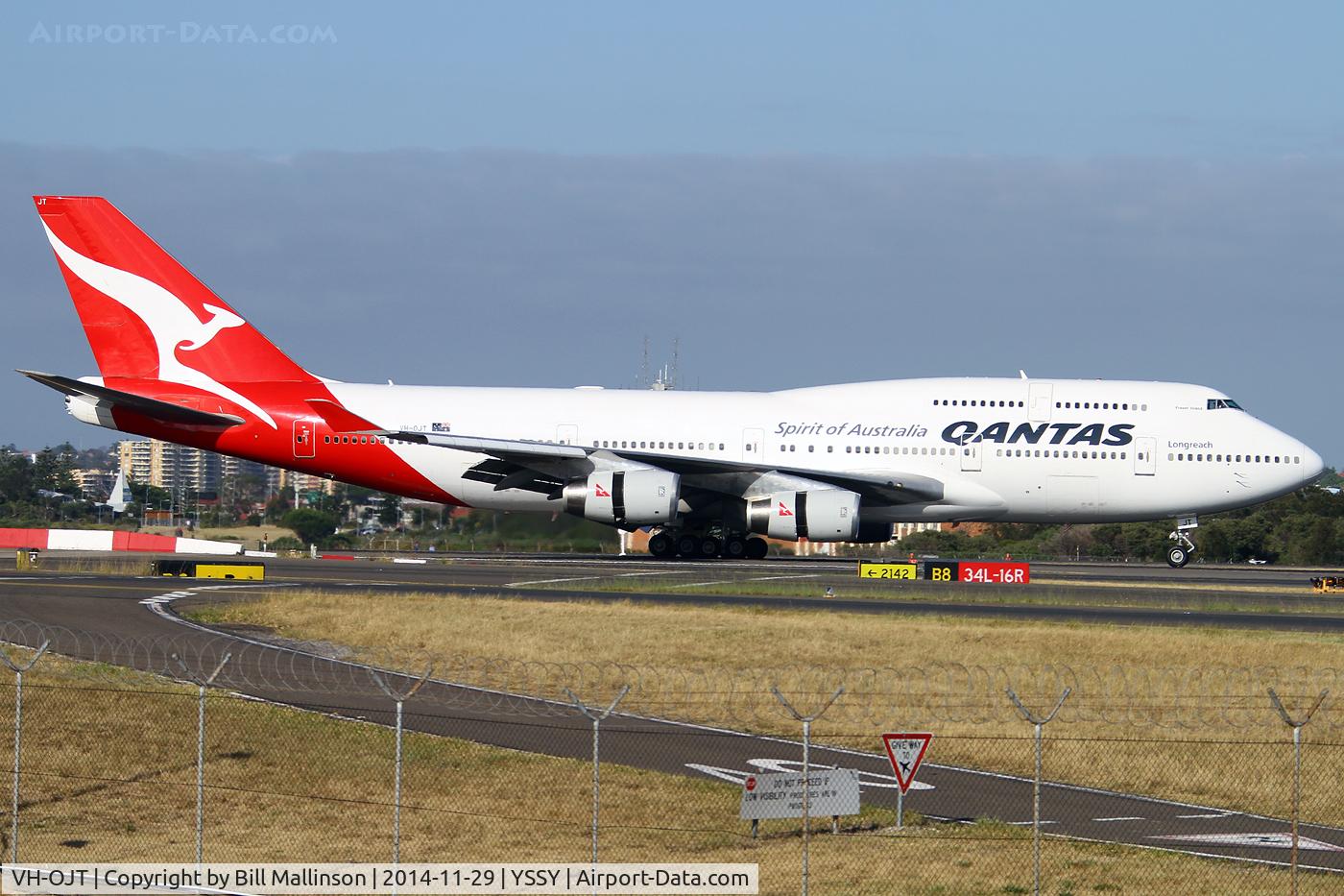 VH-OJT, 1999 Boeing 747-438 C/N 25565, just down onto 34L