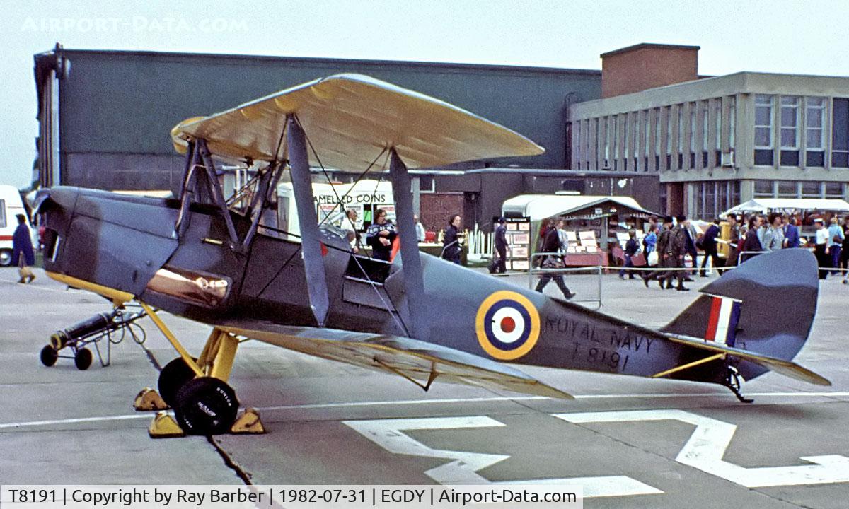 T8191, 1941 De Havilland DH-82A Tiger Moth II C/N 84483, De Haviland DH.82A Tger Moth [84483] (Royal Navy) RNAS Yeovilton~G 31/07/1982. From a slide.