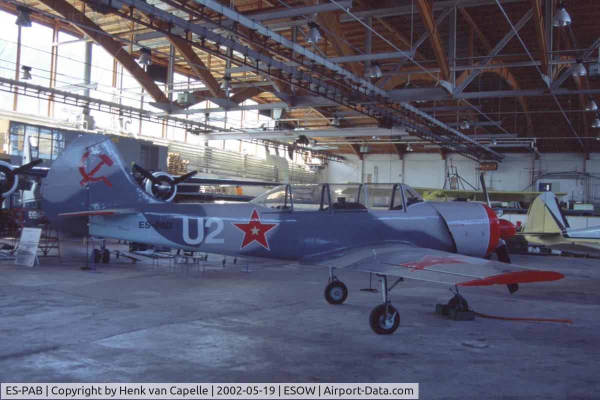 ES-PAB, 1983 Yakovlev Yak-52 C/N 833113, Yakovlev Yak-52 in the hangar of the Västerås Flygmuseum.