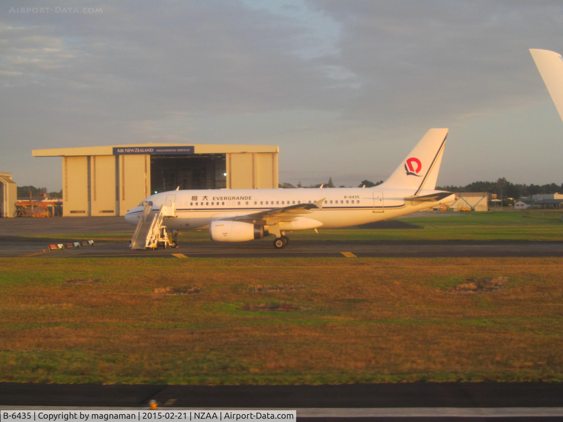 B-6435, 2010 Airbus ACJ319 (A319-133/CJ) C/N 4428, on taxiway viewed from inside another taxying aircraft