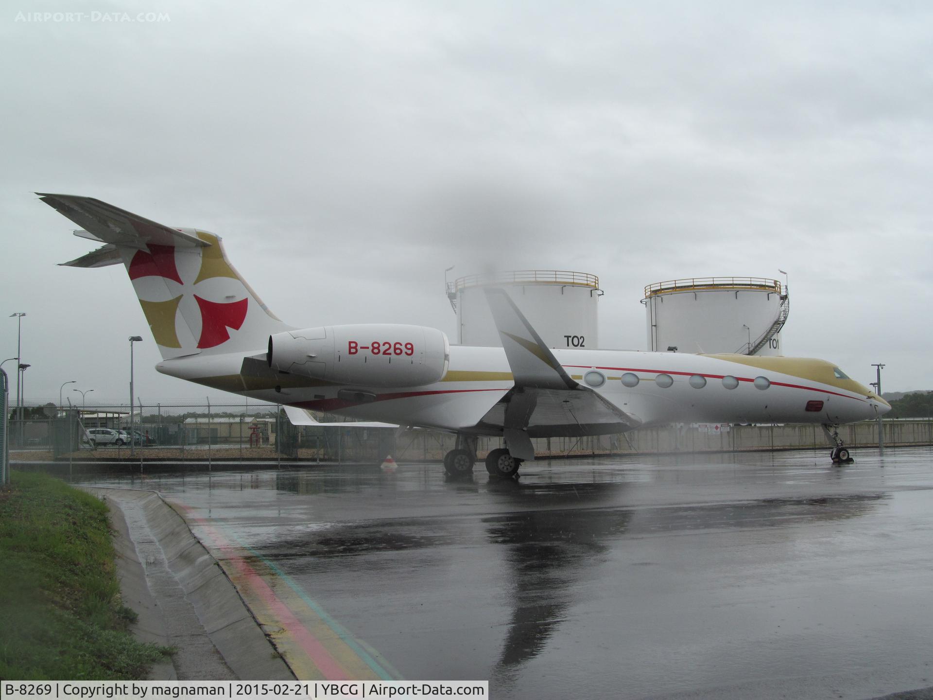 B-8269, Gulfstream Aerospace GV-SP (G550) C/N 5404, on ramp at gold coast - was raining hard at time and got drops on lens!