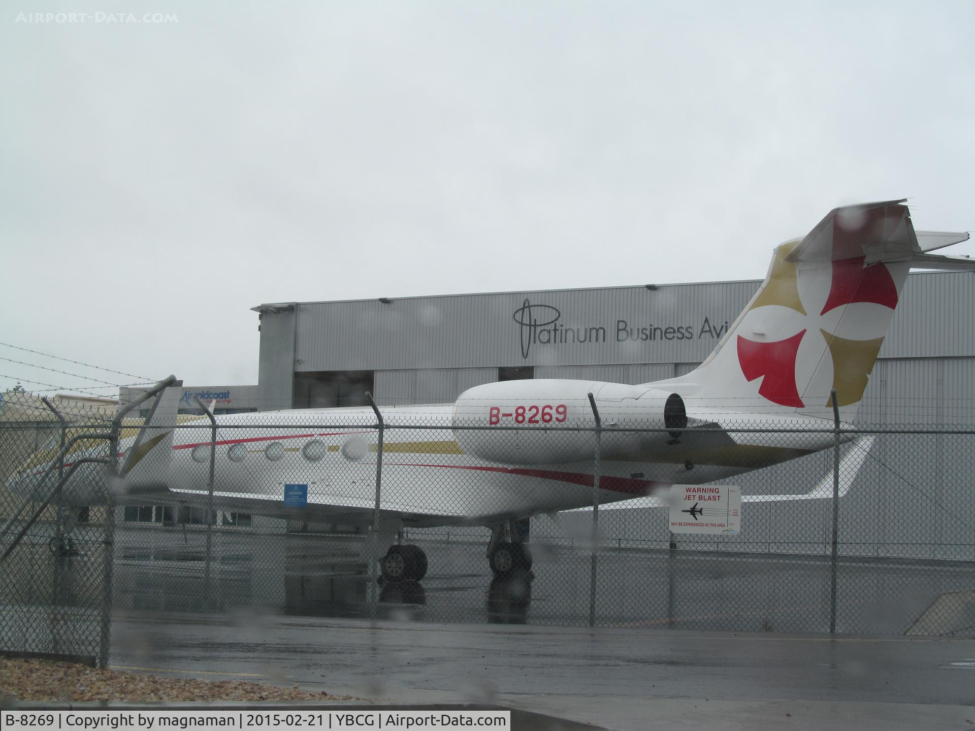 B-8269, Gulfstream Aerospace GV-SP (G550) C/N 5404, from inside dry car in the rain