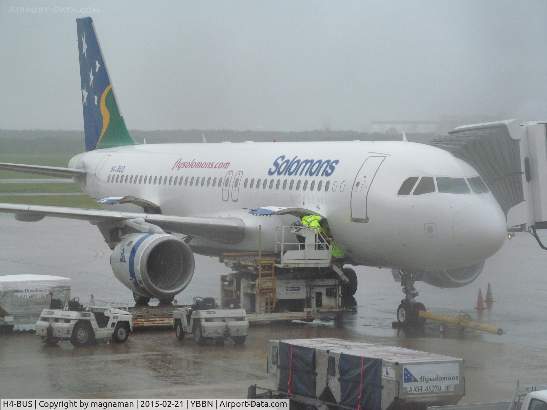 H4-BUS, 1992 Airbus A320-211 C/N 302, on stand at international terminal