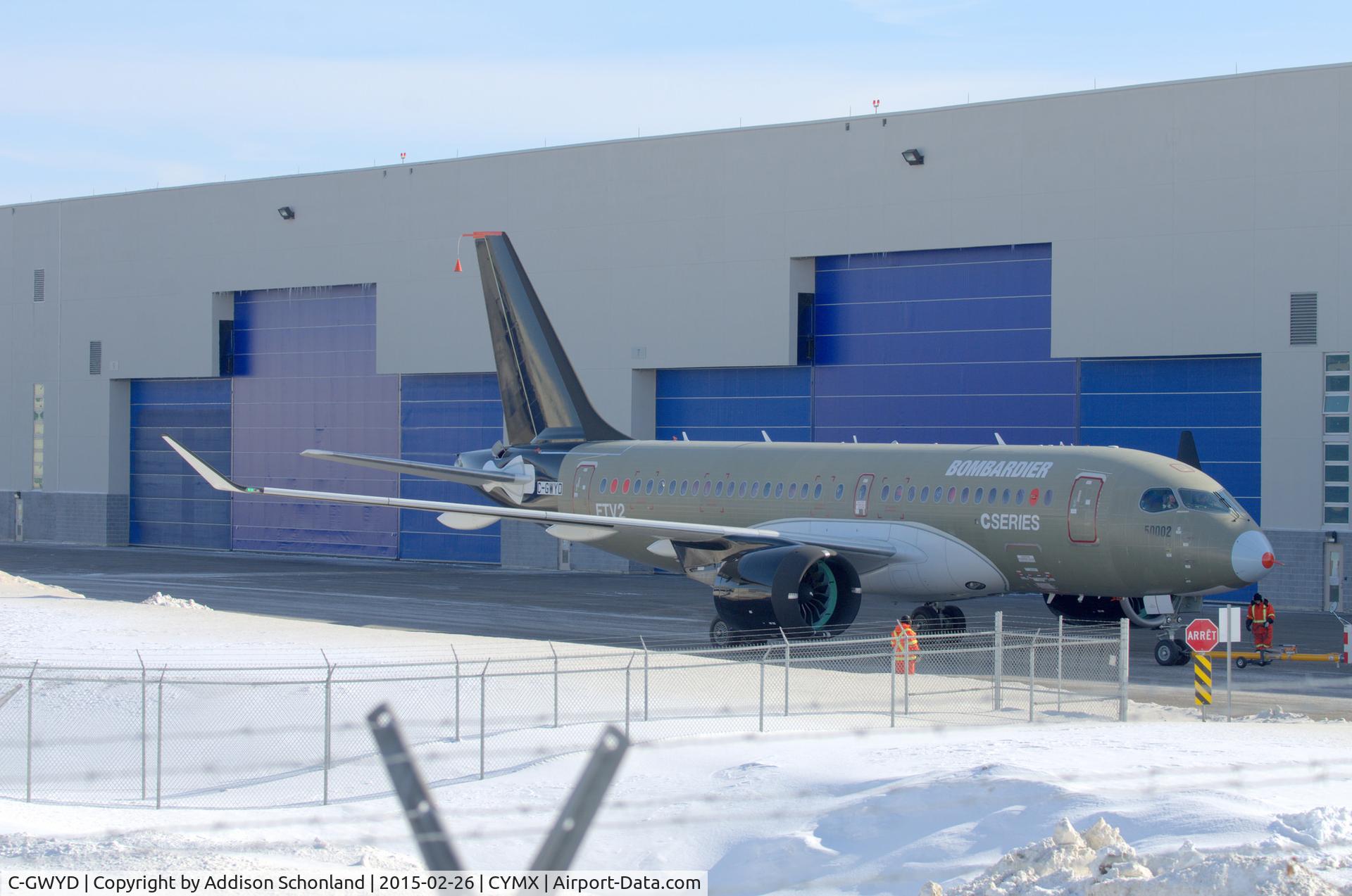 C-GWYD, 2013 Bombardier CSeries CS100 (BD-500-1A10) C/N 50002, FTV2 painted with black tail, engines and winglets for ice testing. Going on a test flight in the cold winter weather.