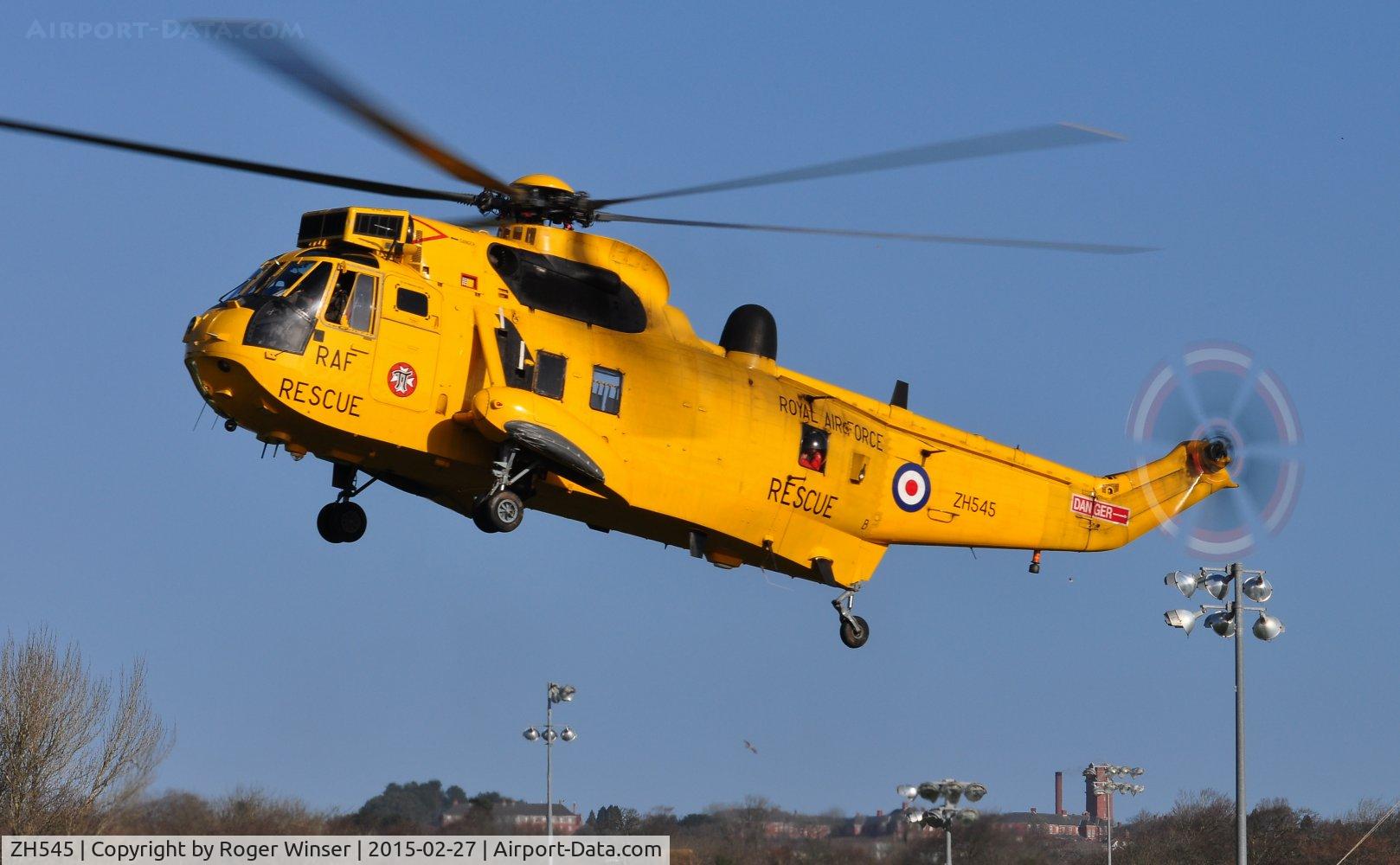ZH545, 1997 Westland Sea King HAR.3A C/N WA1011, Off Airport. Rescue helicopter operated by 22 Squadron RAF lifting off from King George V Playing Fields, Ashleigh Road, Swansea after an overnight stop for repairs.