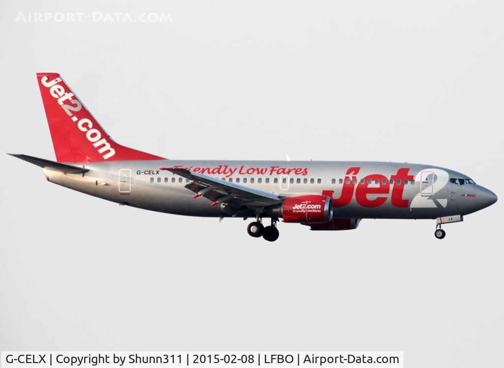 G-CELX, 1986 Boeing 737-377(QC) C/N 23654, Landing rwy 32L with additional 'Friendly Low Fares' titles