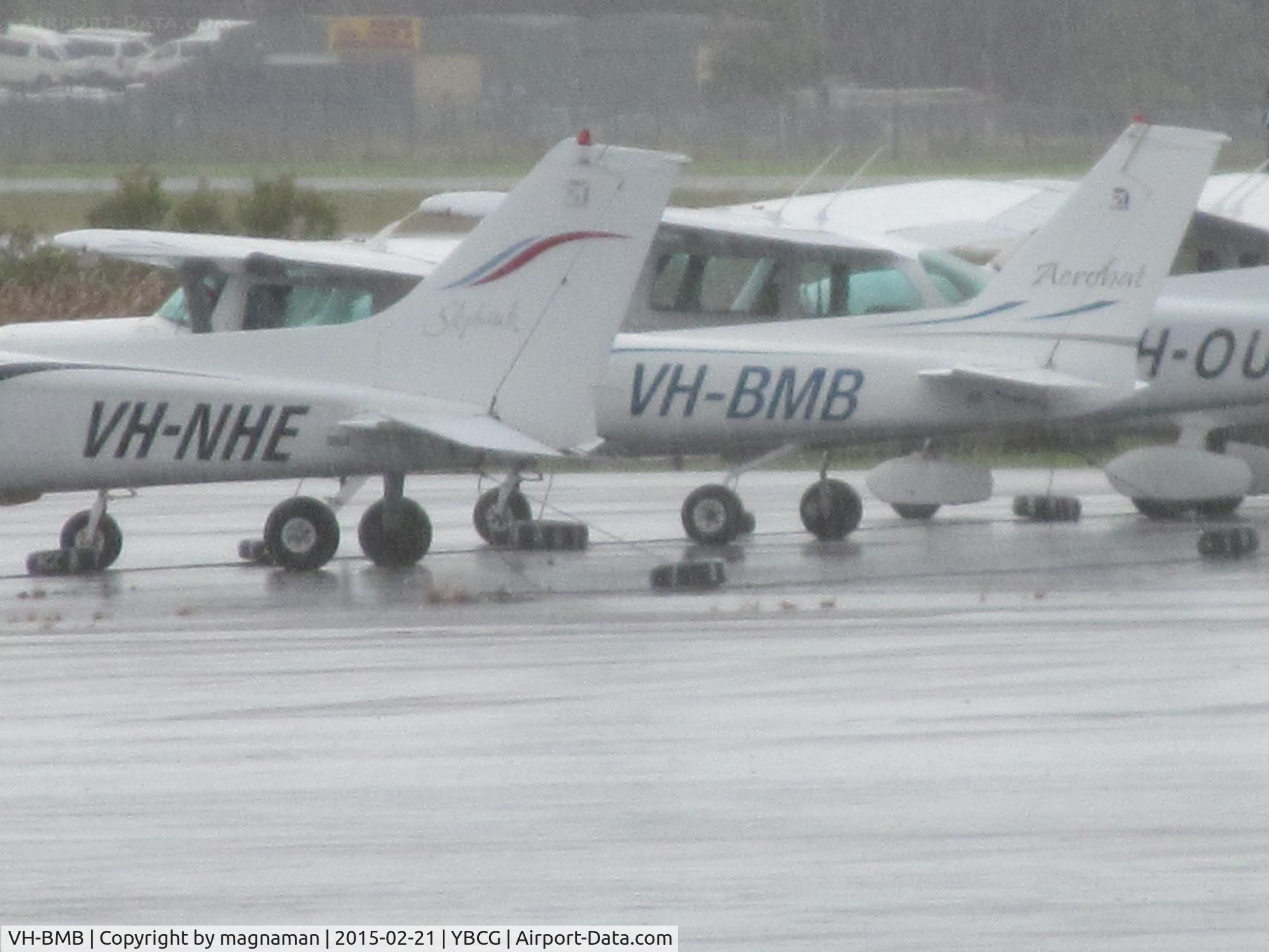 VH-BMB, Cessna A152 Aerobat C/N A1520903, on general aviation ramp in the rain