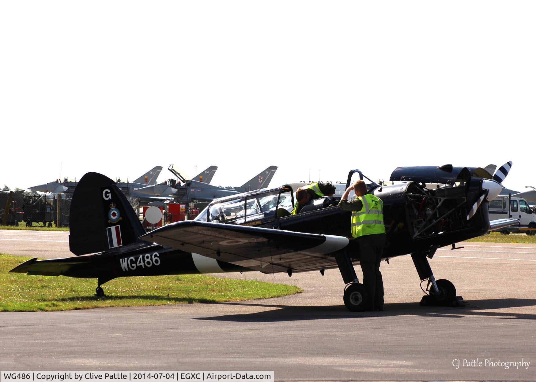 WG486, 1952 De Havilland DHC-1 Chipmunk T.10 C/N C1/0536-DHB.f421, Flightline staff at work on the BBMF's Chippie at RAF Coningsby EGXC