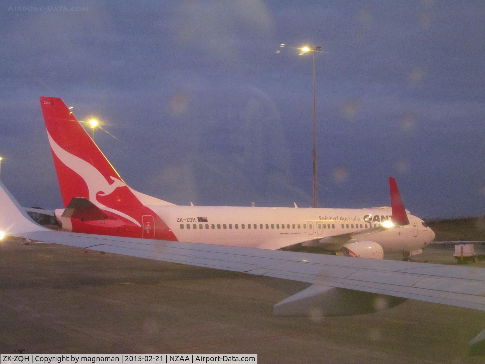 ZK-ZQH, 2011 Boeing 737-838 C/N 39357, taken from seat in ZK-PBI awaiting push back - about 6.30am
