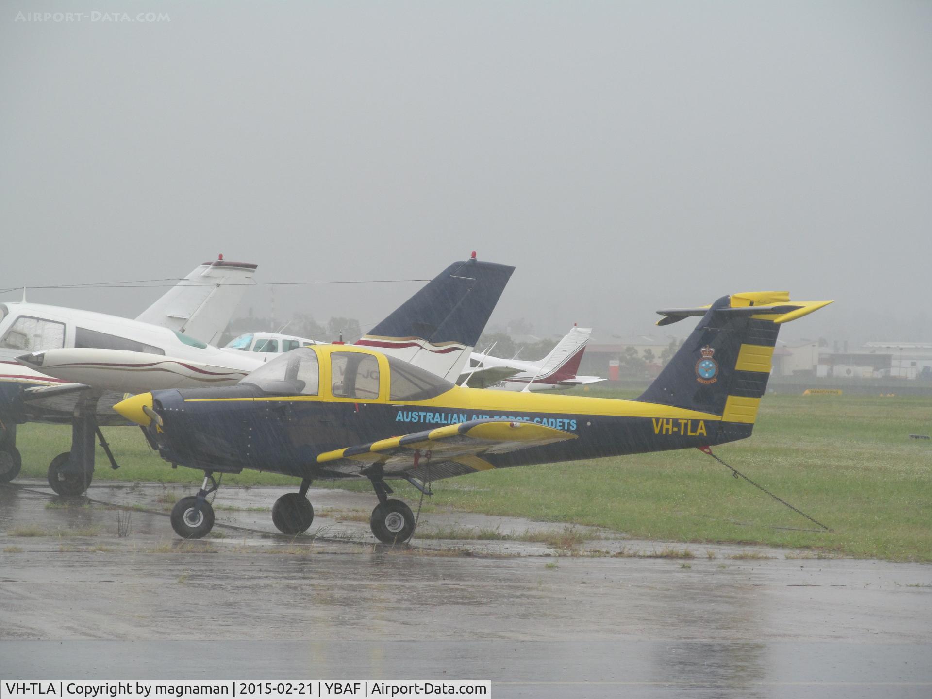 VH-TLA, 1978 Piper PA-38-112 Tomahawk Tomahawk C/N 38-78A0491, on very wet apron at Archerfield