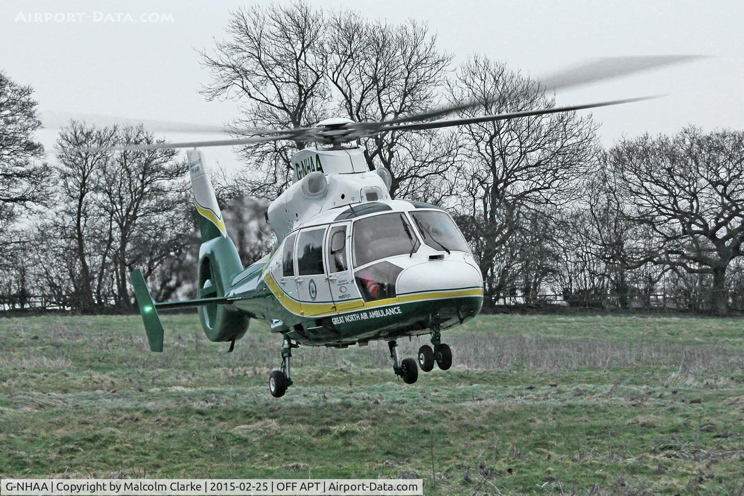 G-NHAA, 1991 Aerospatiale AS-365N-2 Dauphin C/N 6431, Great North Air Ambulance Aerospatiale AS-365N-2 Dauphin on an emergency call in Sedgefield Village UK. February 25th 2015.