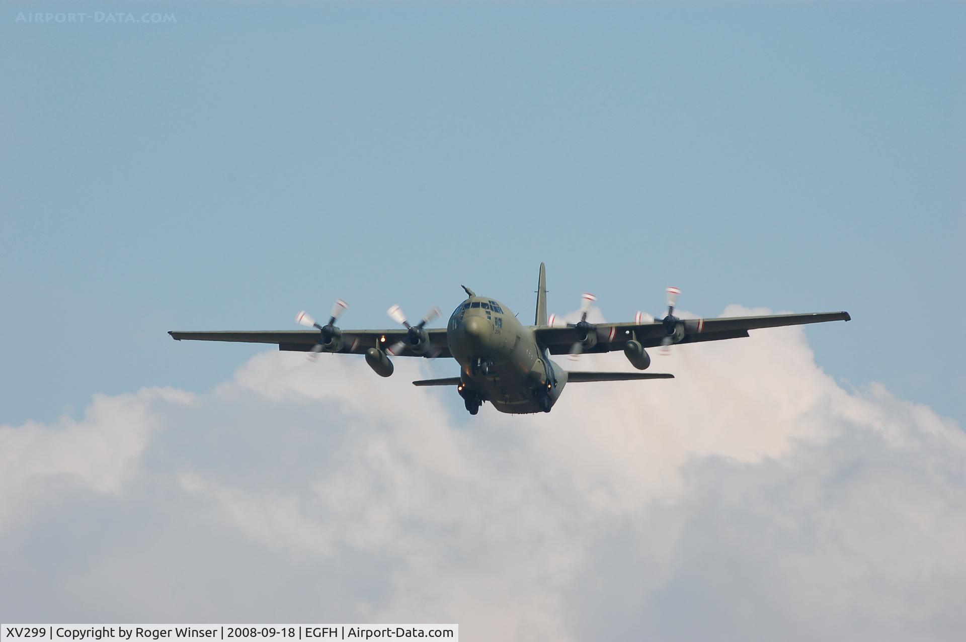 XV299, Lockheed C-130K Hercules C.3 C/N 382-4266, RAF Hercules C3 coded 299 of the Lyneham Transport Wing overflies Runway 22