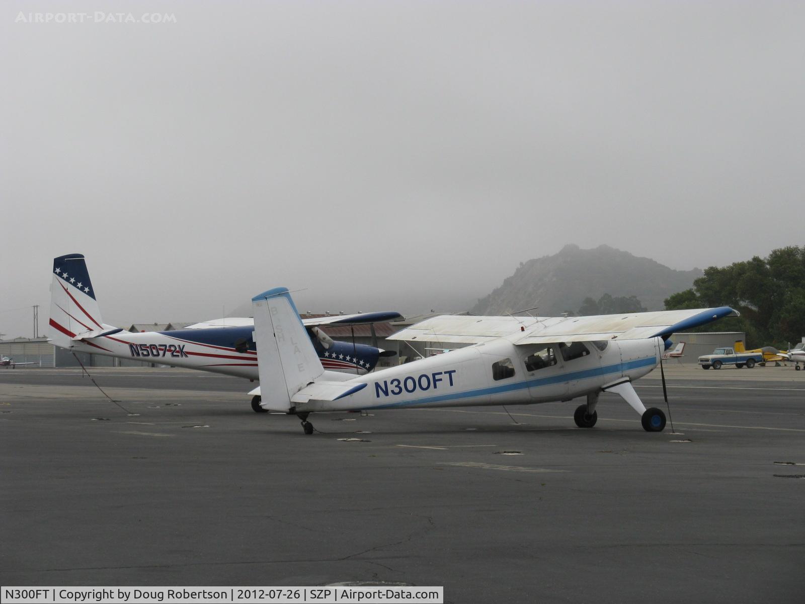 N300FT, 1971 Helio H-295-1400 Super Courier C/N 1440, Two Helio H-295 SUPER COURIER STOL aircraft; one converted to HT-295 with tri-gear. N300FT is a 1971 H-295 and N5072K behind is a 1967 H-295 converted to HT-295. Unusual pair!