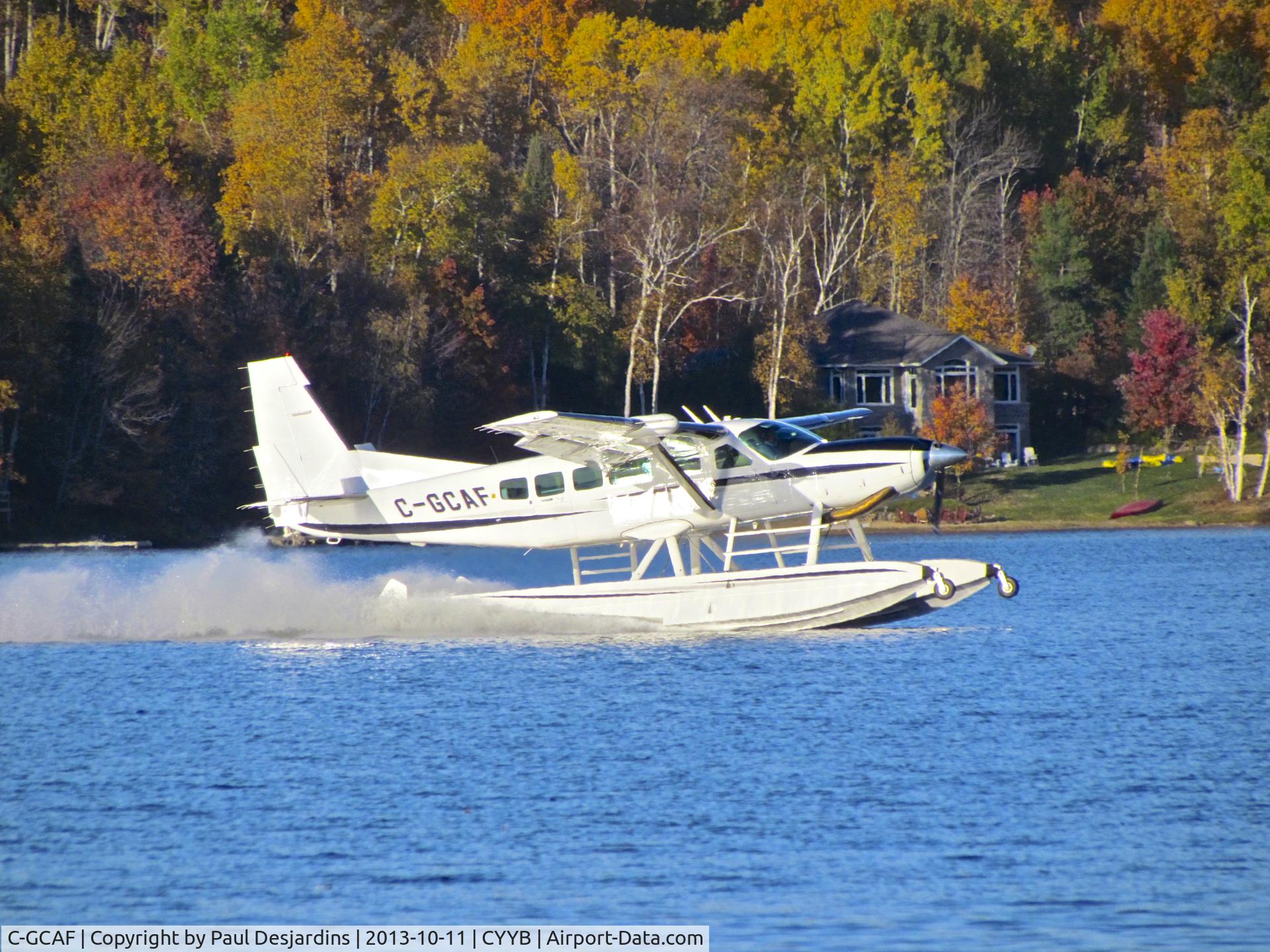 C-GCAF, 2003 Cessna 208 Caravan I C/N 20800371, A beautiful site around Trout Lake near North Bay, ON.