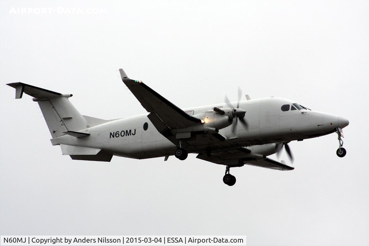 N60MJ, 1993 Beech 1900D C/N UE-60, On short final for runway 01L. Arriving from  Warsaw Chopin Airport.